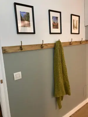 a bathroom with a green towel hanging on a wall at Charming appartement in the heart of Barcelona in Barcelona