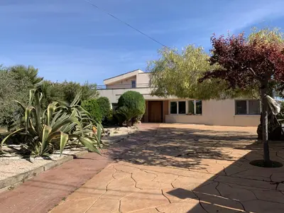 a house with a driveway in front of it at Apartamento entero con vistas panorámicas in Avinyonet