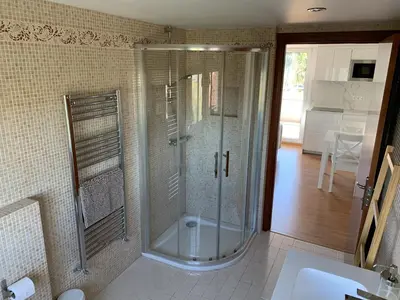 a bathroom with a shower and a sink at Apartamento entero con vistas panorámicas in Avinyonet