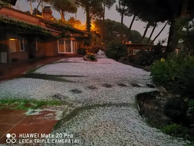 a driveway in front of a house at night at Villa Maresme & Villa Rosa in Mataró