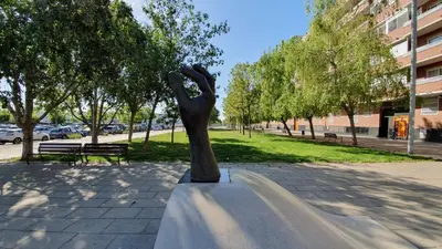 a statue of a person standing on a sidewalk at Apto, Ático Airport BCN, Cruise Port, Near beaches in Viladecáns
