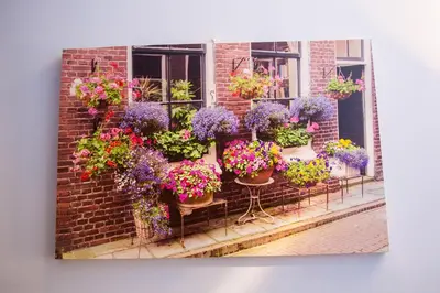 a bunch of flowers in pots on a building at Apartamento Rosellón in Barcelona