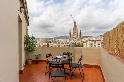 a small bedroom with a bed and a window at AB Sagrada Familia Views in Barcelona