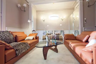 a living room with two couches and a glass table at My Space Barcelona Rambla Catalunya Center in Barcelona