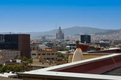 a view of a city from the roof of a building at Stay U-nique Apartments Taulat in Barcelona