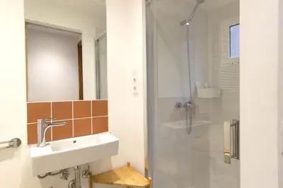 a bathroom with a sink and a shower at Bellafila Gothic Terrace in Barcelona