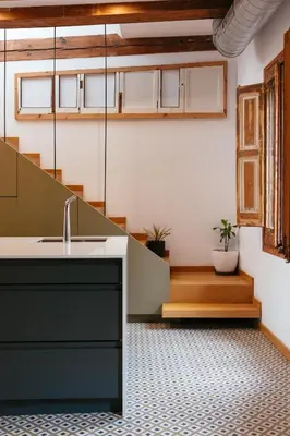 a kitchen with a sink and a counter at Bellafila Gothic Terrace in Barcelona