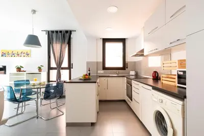 a bathroom with a shower with a glass door at AB Plaça de Sants in Barcelona
