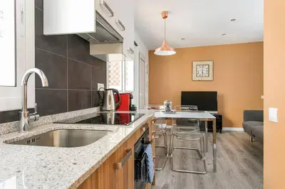 a kitchen with a sink and a counter at Cozy&new With Terrace in Hospitalet de Llobregat