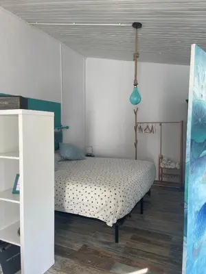a bedroom with a bed in a room at Raconet Azul - Circuito Cataluña in Vallromanas