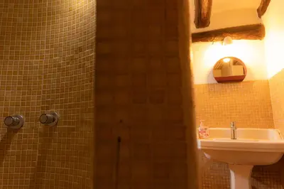a bathroom with a sink and a toilet at Masia en plena naturaleza y tranquilidad in San Quintín de Mediona