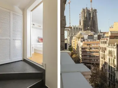 a balcony with a view of a city at Attic Apartment 468 Sagrada Familia in Barcelona