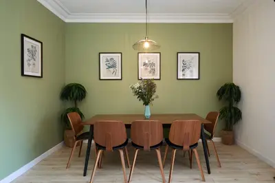 a dining room with a table and chairs at Casa Cosi - Casanova 3 in Barcelona