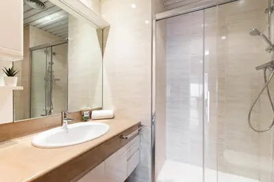 a bathroom with a sink and a shower at Stay U-nique Apartments Sant Antoni II in Barcelona