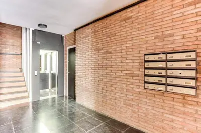 a brick wall with drawers on a wall at Bright 2bdr In Trendy Gracia in Barcelona