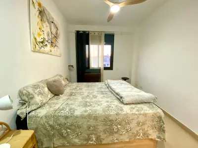 a bedroom with a bed and a window at Terraza Relajante Galvani in Terrassa