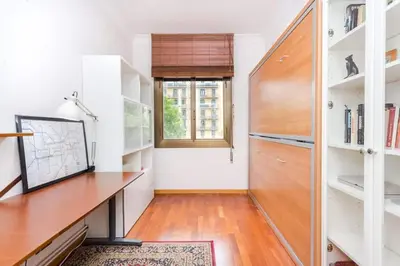 a home office with a desk and a window at Central 2 Bedroom By Sagrada Familia in Barcelona