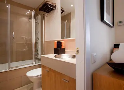 a bathroom with a toilet and a sink and a shower at rentBCN Gracia Jardinets in Barcelona
