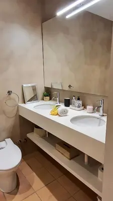 a bathroom with two sinks and a mirror and a toilet at Opening Doors Vilassar. Family house Beach & Relax in Vilassar de Mar