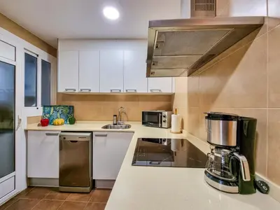 a kitchen with a blender on a counter at Apartment PICNIC SANTS in Barcelona