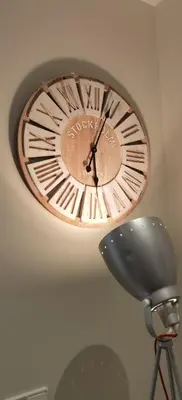 a clock on the ceiling of a room at Barcelona, Apartamento de 2 habitaciones. in Hospitalet de Llobregat
