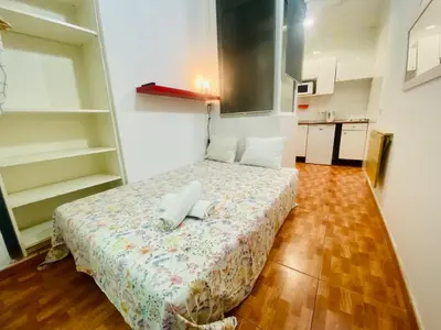 a small bedroom with a bed in a room at 01 Apartamento 2 ,3 in Barcelona