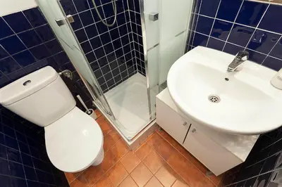 a bathroom with a toilet and a sink and a shower at SAGRADA FAMILIA APARTAMENT in Barcelona