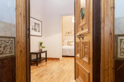 an open door to a bedroom with a bed at Be Barcelona Plaza Catalunya in Barcelona