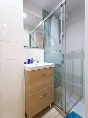 a bathroom with a sink and a shower at COLORS FIRA GRAN VIA in Hospitalet de Llobregat