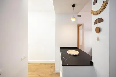 a kitchen with a counter with a bowl on it at Charming 2br In Trendy Gracia in Barcelona