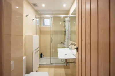 a bathroom with a shower and a sink and a toilet at Charming 2br In Trendy Gracia in Barcelona