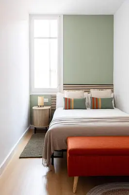 a bedroom with a large bed and a window at Charming 2br In Trendy Gracia in Barcelona