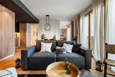 a bedroom with a large bed and a window at BENI - 1 bedroom apartment with pool and terrace in Gracia in Barcelona