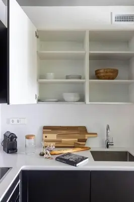 a kitchen with a sink and a counter top at SAVANNAH - One Bedroom with a Private Office in Barcelona