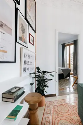 a kitchen with white cabinets and a washer and dryer at LLANOS - Two Bedroom apartment in heart of the city in Barcelona