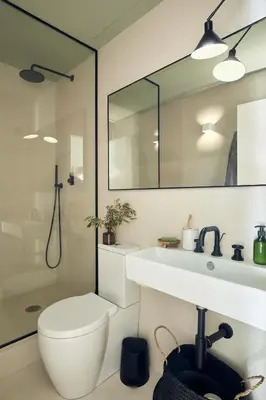 a bedroom with a white bed and a door at CASSIS - Two bedroom apartment in Barcelona in Barcelona