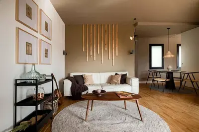 a office with a desk with a laptop and a chair at DOURO - Penthouse with a view of the Sagrada F. in Barcelona