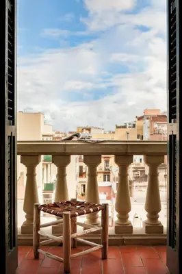 a living room with a couch and a table at ROVIRA - One bedroom apartment in Penedes in Barcelona