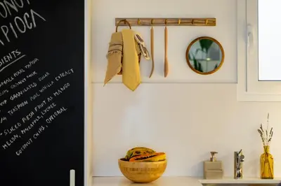 a hammock is hanging in a living room at ROVIRA - One bedroom apartment in Penedes in Barcelona
