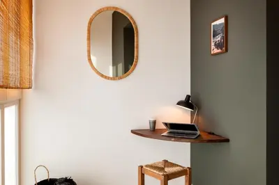 a room with a desk with a laptop and a chair at TEFE - Two Bedrooms apartment in Gracia in Barcelona