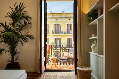 a dining room with a table and chairs at MILOS - Two bedroom apartment in Mallorca St in Barcelona
