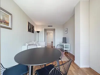 a living room with a table and chairs at Stay U-nique Apartments Sants II in Barcelona