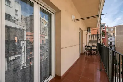 a balcony with a view of a city at Be Barcelona Eixample Urquinaona II in Barcelona