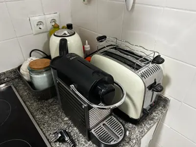 a kitchen counter with a toaster on a counter top at Nice apartment close PARK GÜELL 2 in Barcelona