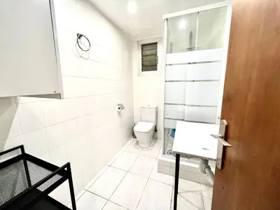 a bathroom with a toilet and a sink at Nice apartment close PARK GÜELL 2 in Barcelona