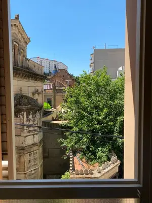 a view of a city from a window at Luminoso apartamento en Canet de Mar cercano a la playa y a Barcelona in Canet de Mar