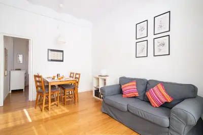 a living room with a couch and a table at Barcelona cozy apartment in Barcelona