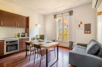 a bathroom with a shower and a toilet and a sink at The Collection Barcelona - Plaza Urquinaona Cozy and comfortable in Barcelona