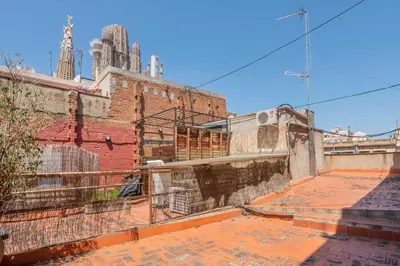 a brick alley with buildings in the background at The Collection Barcelona -3BD with private terrace right by Sagrada Familia in Barcelona