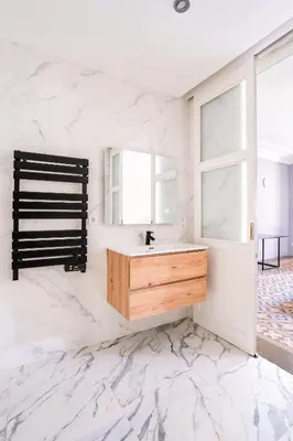 a bathroom with a sink and a mirror at The Collection Barcelona - Ronda Sant Pere in Barcelona